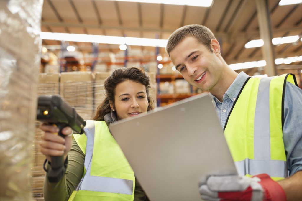 Atvido warehouse team checking a parcel